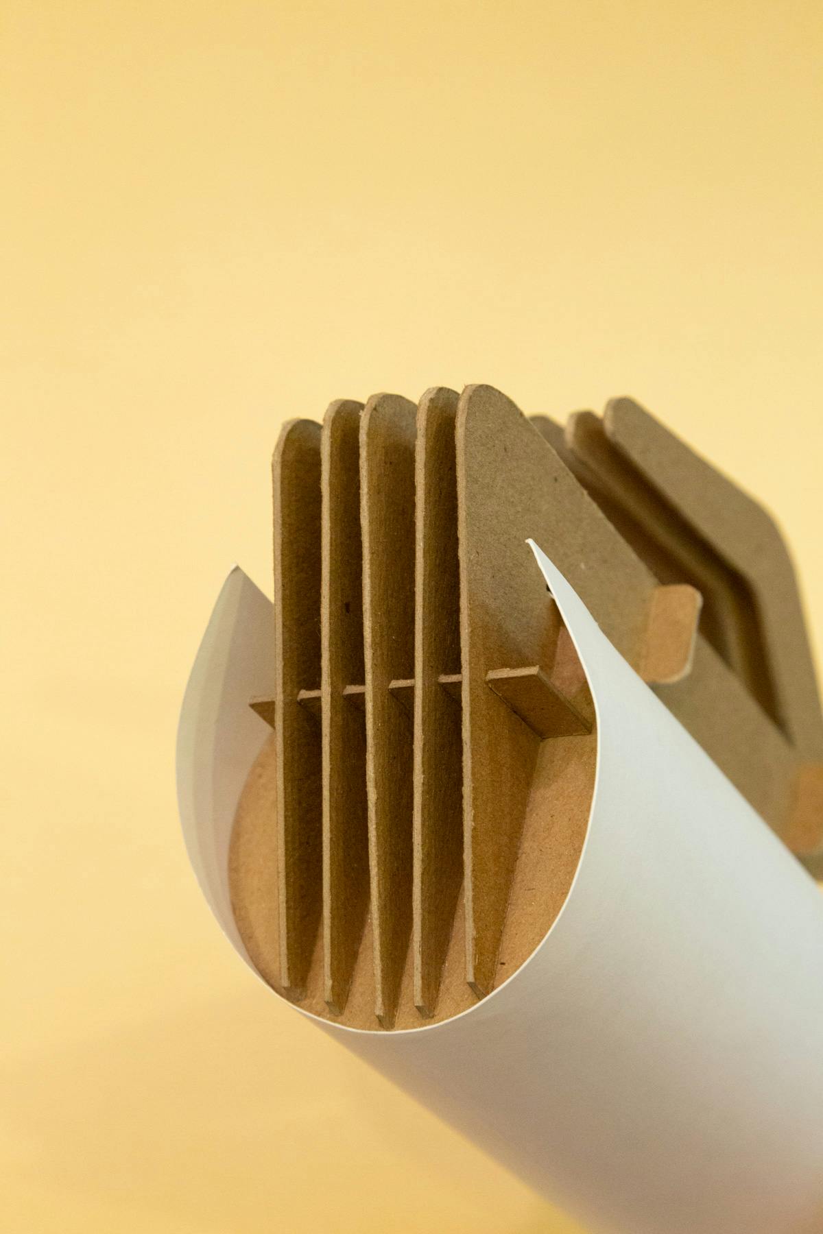 Close-up of the bottom of the model. The chipboard pieces of the handle form a repetitive pattern that looks like a heatsink.