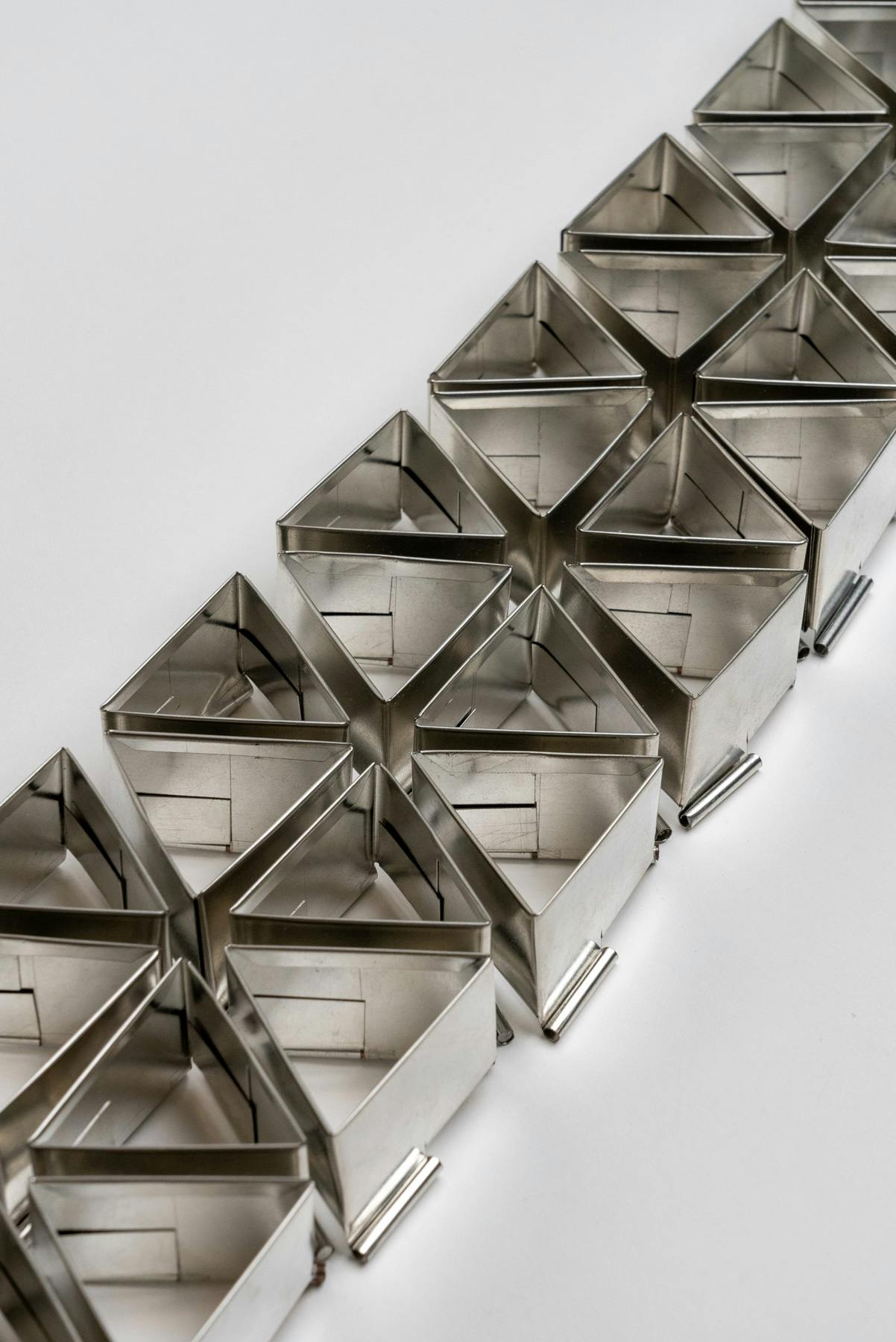 Close-up of the triangular prisms. The folds and layers that result from their construction are visible.