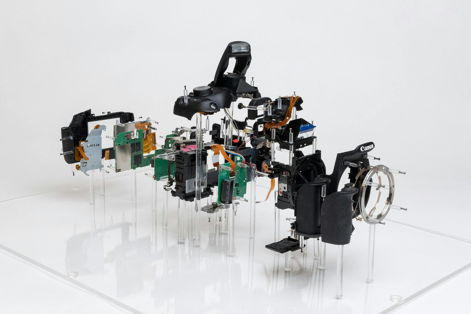 Three-quarter side view of the final exploded view model. Each piece is held above the acrylic base with acrylic rods that are cut perfectly to length.